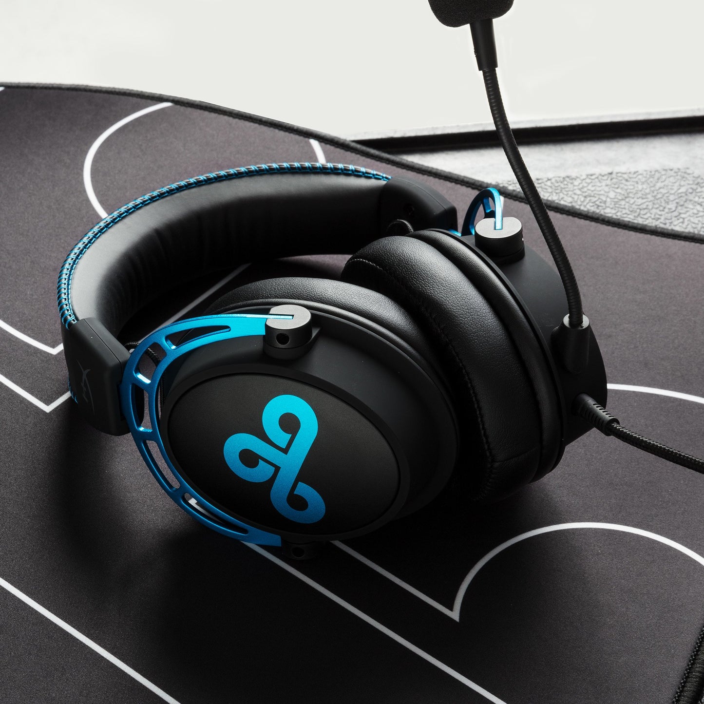 Black/Blue HyperX gaming headset Cloud9 edition on the table